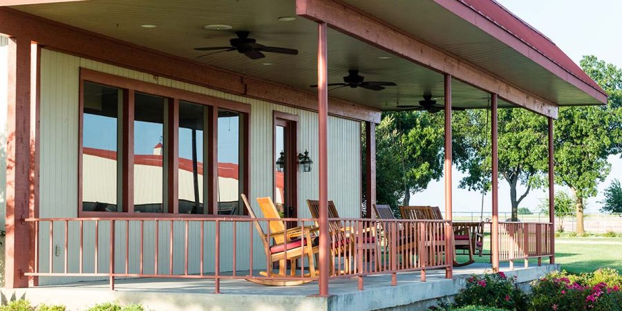 dg ranch outdoor seating area with rocking chairs tx texas facility facilities amenities